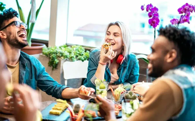 Multicultural Friends Eating Together
