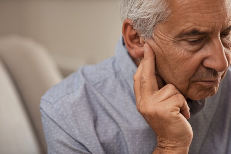 Side,View,Of,Senior,Man,With,Symptom,Of,Hearing,Loss