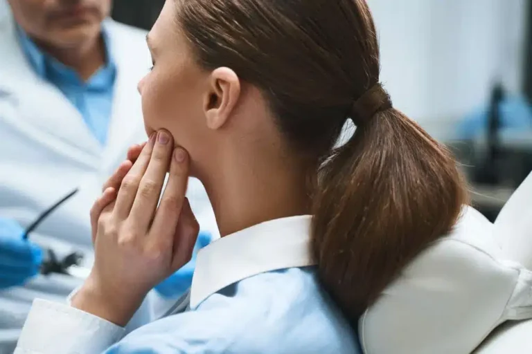 Woman Complaining On Toothache In Clinic